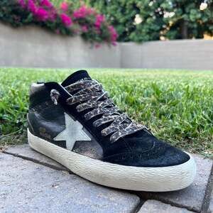 Golden Goose Black and White Star Sneakers with Leopard Laces